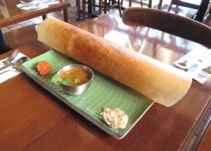 Davie Dosa Company - What is a Dosa - Dosa on a table